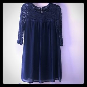 Cute 3/4 sleeve lace detailed dress.